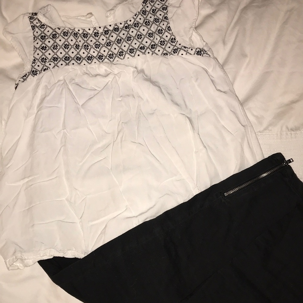 Straight legged black pants with black & white top